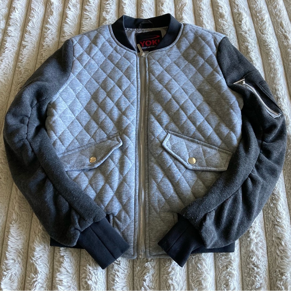 Yoki size small light grey with dark grey sleeves jacket.